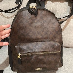 Large coach backpack.